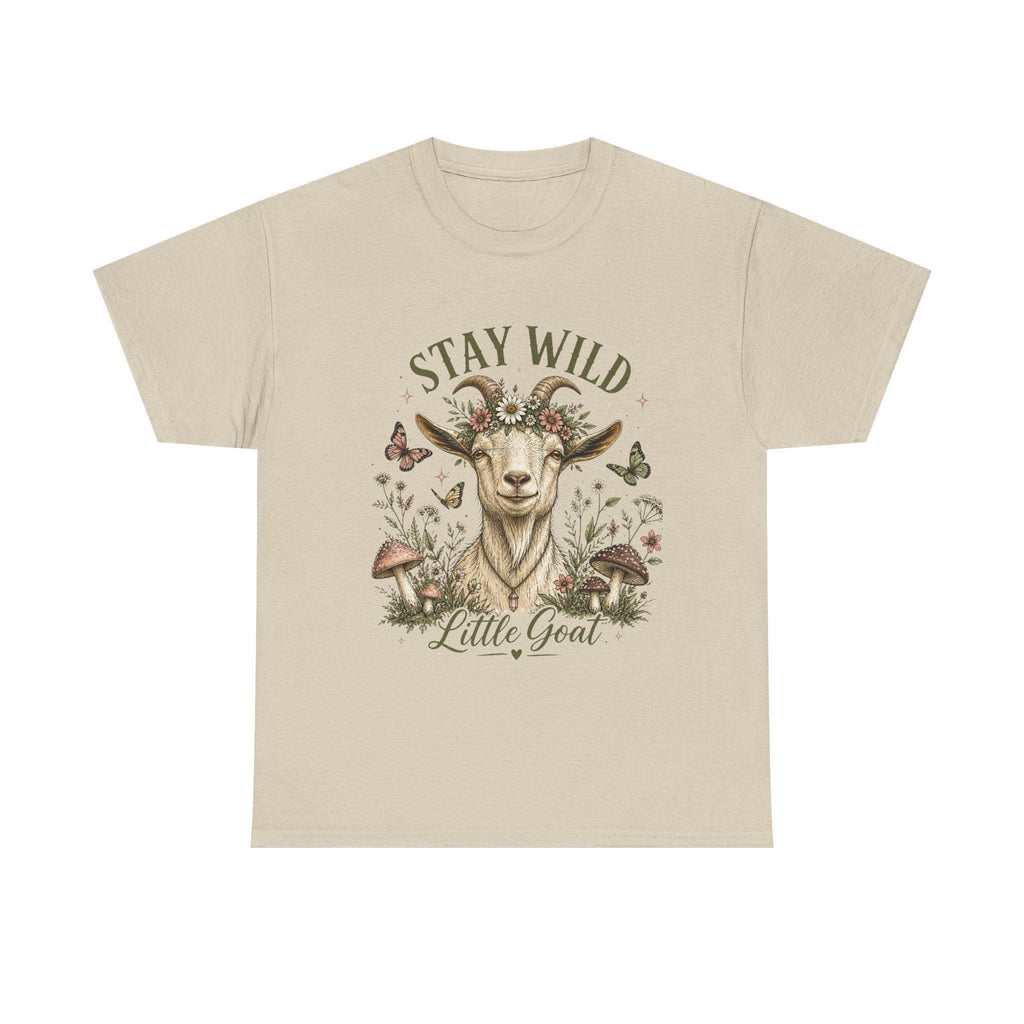 A light beige t-shirt with a graphic of a goat wearing a floral crown, surrounded by mushrooms and butterflies, with the text "Stay Wild Little Goat."
