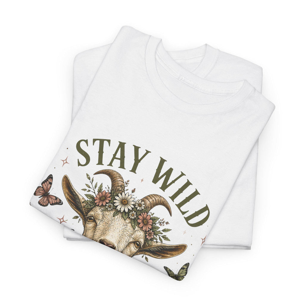 Two folded white t-shirts, with the top one displaying the upper half of a goat wearing a floral crown and the text "Stay Wild."
