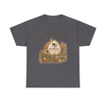 A dark gray t-shirt with a graphic of a barn, sunflowers, pumpkins, and a ghost in a window, with "Spooky Season" text.