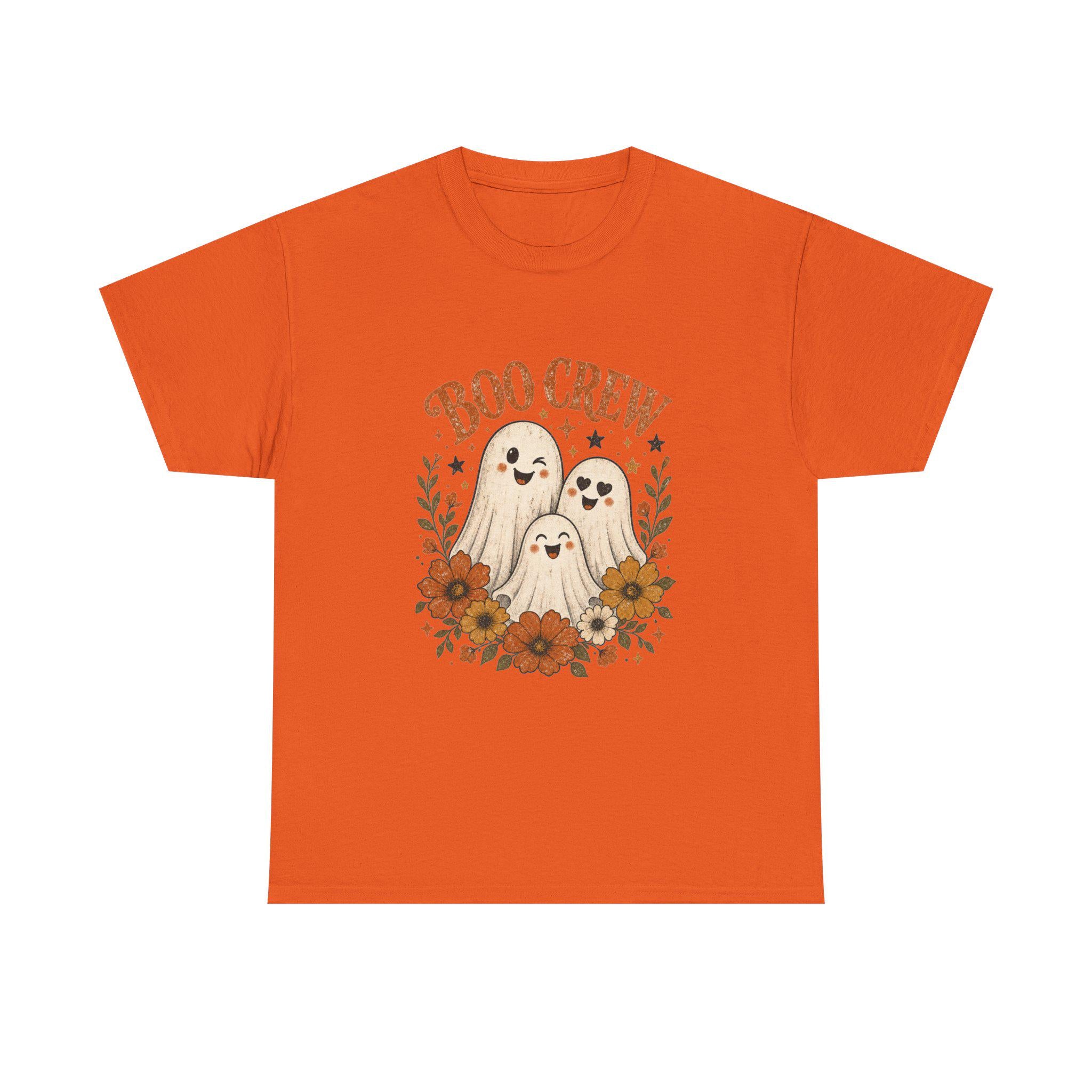 An orange t-shirt with a "Boo Crew" graphic featuring three ghosts surrounded by orange and white flowers.
