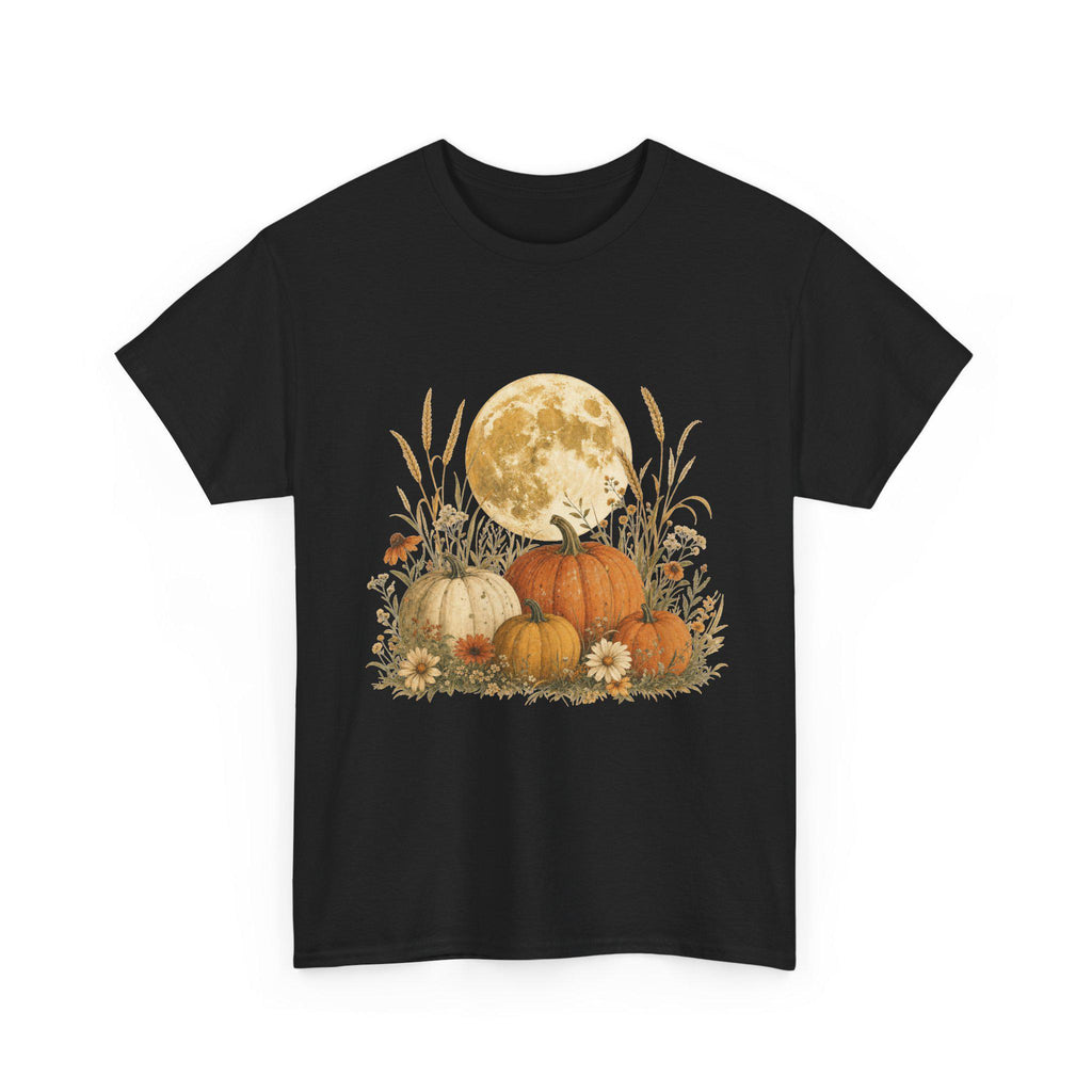 A black t-shirt displays a graphic of a large full moon behind a cluster of pumpkins, tall grasses, and small flowers.