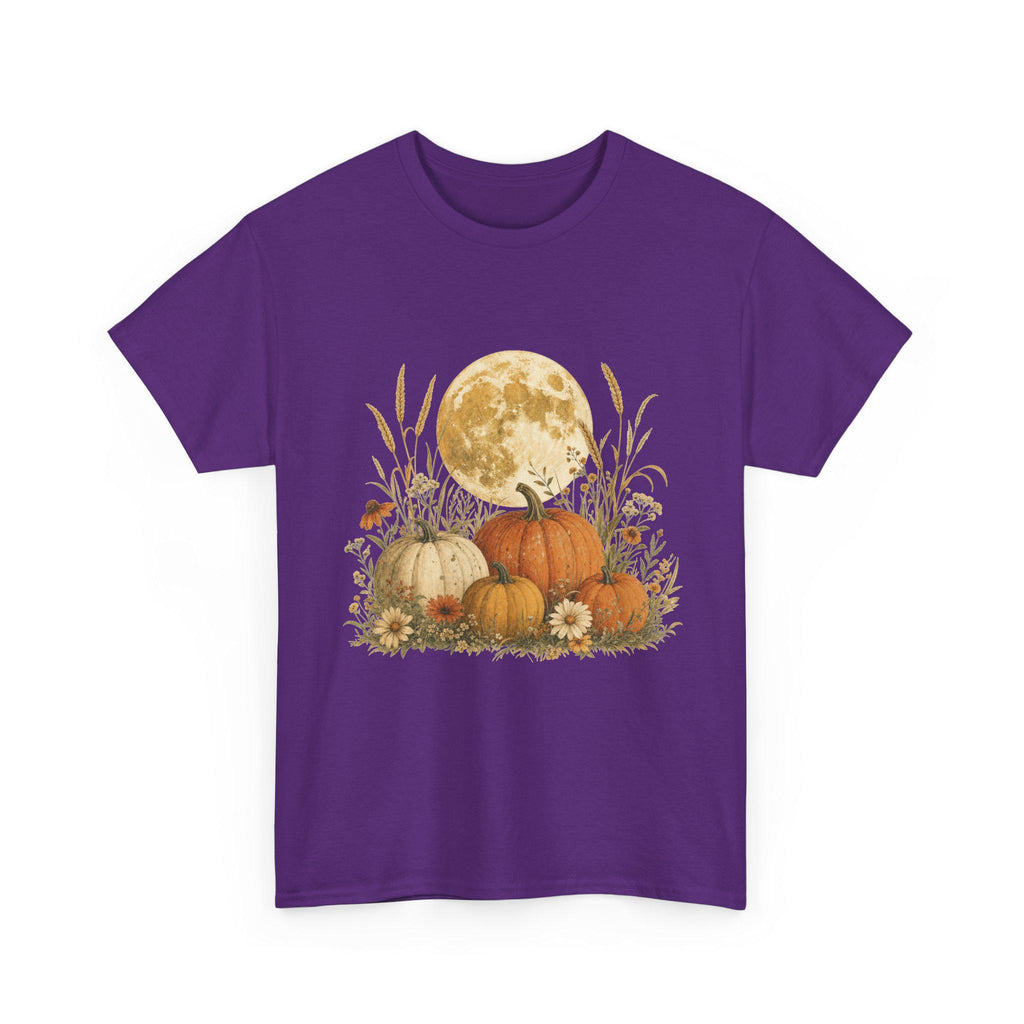 A purple t-shirt displays a graphic of a large full moon behind a cluster of pumpkins, tall grasses, and small flowers.